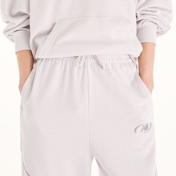 new balance - Perna larga Calças 'Trackside French Terry Pant' em branco