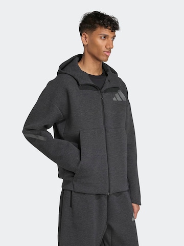 ADIDAS SPORTSWEAR Sports sweat jacket 'Z.N.E.' in Black: front