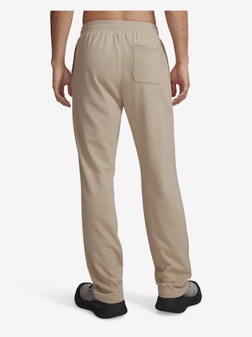 UNDER ARMOUR Loosefit Sportbroek 'UA Rival' in Bruin