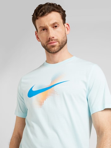 Nike Sportswear T-Shirt 'SWOOSH' in Blau