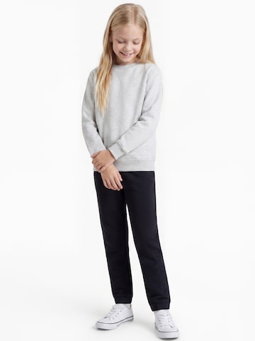 Champion Tapered Hose in Schwarz: Vorderseite