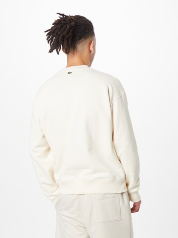 Sweat-shirt LACOSTE en blanc