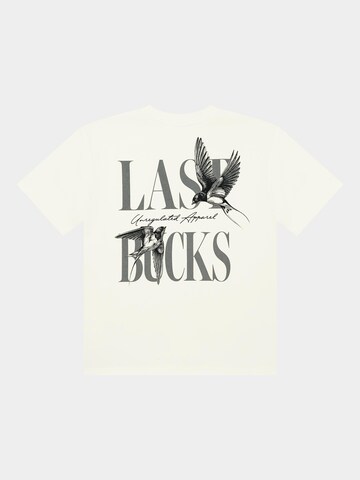 Maglietta 'Last Bucks | Uncaged Birds' di Last Bucks in bianco