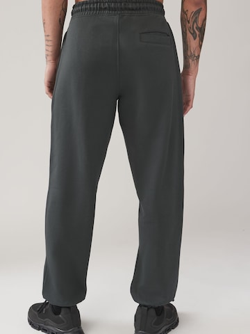 Tapered Pantaloni di Next in grigio