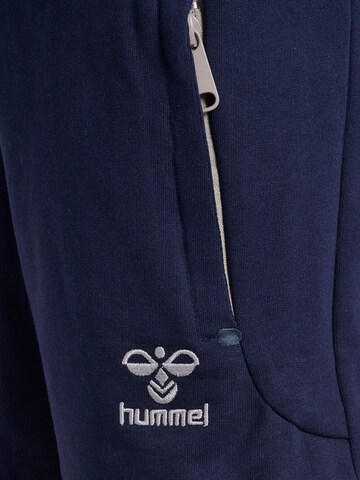 Hummel Regular Workout Pants 'MOVE GRID' in Blue