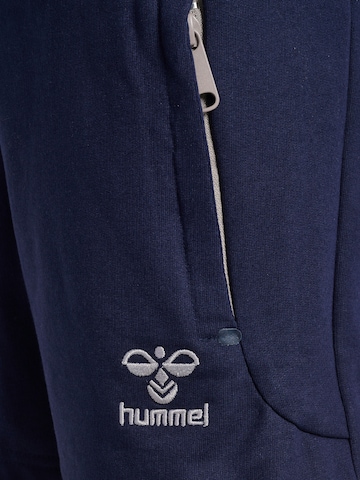 Hummel Regular Workout Pants 'MOVE GRID' in Blue