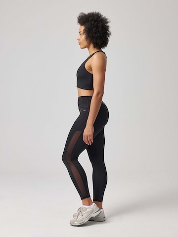 SNOCKS Skinny Sportbroek in Zwart