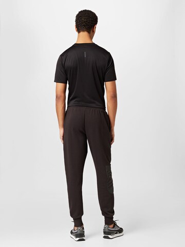 PUMA Tapered Workout Pants in Black