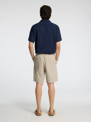 regular Pantaloni chino 'SLHKARL' di SELECTED HOMME in beige