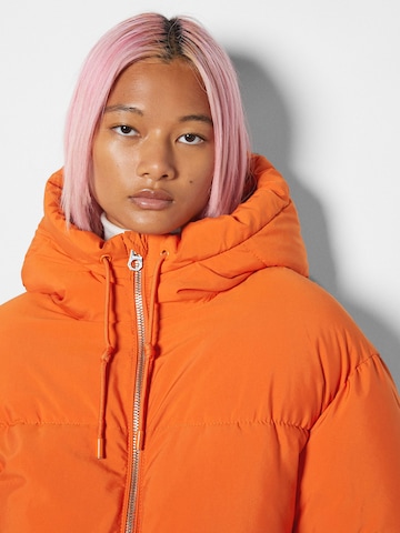 Bershka Winterjas in Oranje