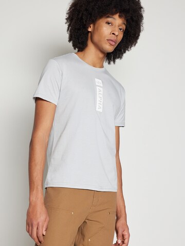ALPHA INDUSTRIES Tričko - Sivá