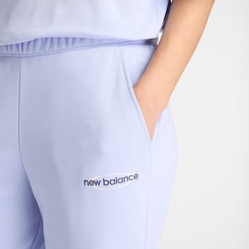 new balance - Pierna ancha Pantalón en lila