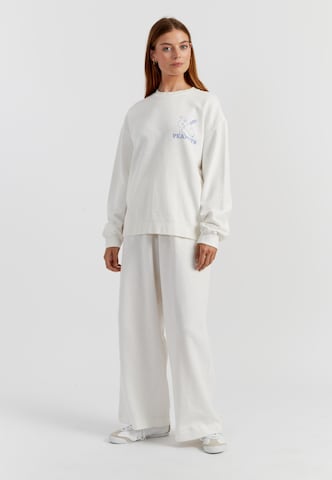 Chinti & Parker - Sudadera 'Peanuts Athletics' en beige