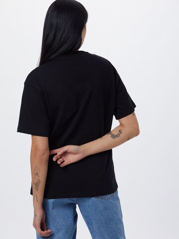 Carhartt WIP T-Shirt 'Chase' in Schwarz