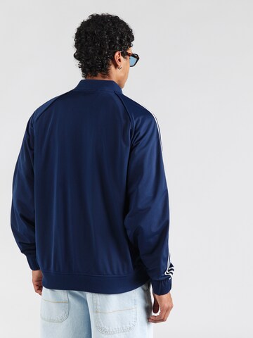 zils ADIDAS ORIGINALS Starpsezonu jaka 'BRITCORE'