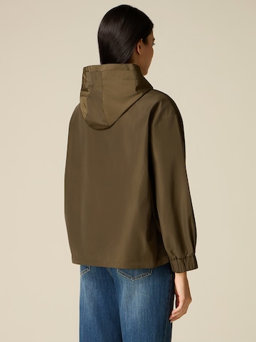 Cappotto invernale di oltre in verde