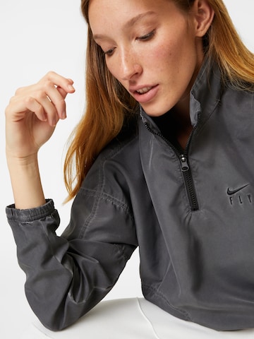 NIKE - Chaqueta deportiva en gris