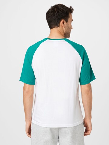 Champion Authentic Athletic Apparel - Camisa 'X Stranger Things' em branco
