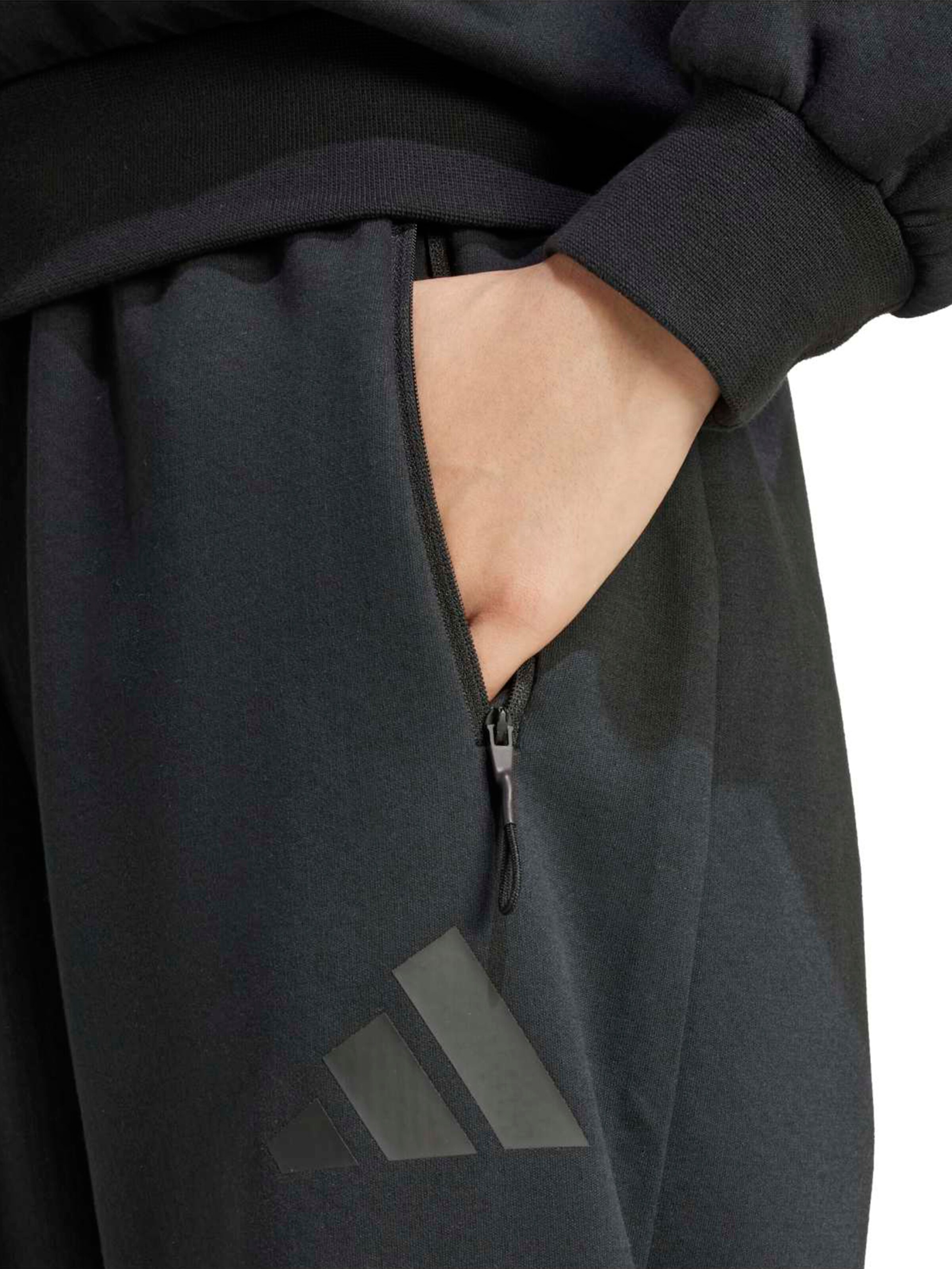 ADIDAS SPORTSWEAR Lużny krój Spodnie sportowe 'Z.N.E.' w kolorze czarny