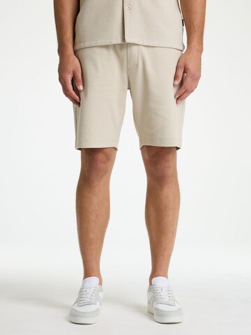 CHASIN' Regular Pants in Beige: front