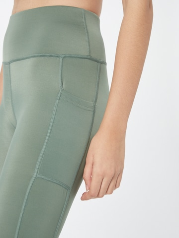 Hummel Skinny Sportovní kalhoty 'Tola' – zelená