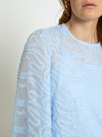 Top 'Odine' di minus in blu