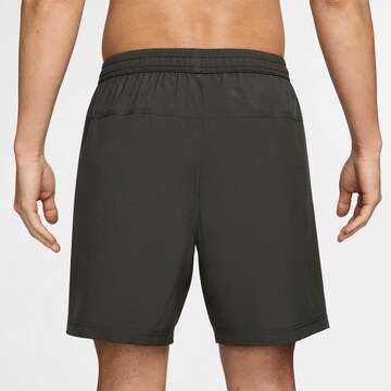 NIKE Regular Workout Pants in Green