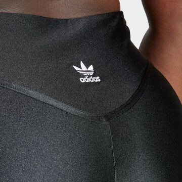 ADIDAS ORIGINALS Skinny Urheiluhousut värissä musta