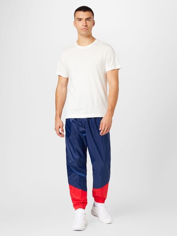 Nike Sportswear Tapered Hose in Blau