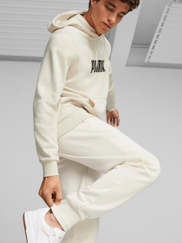 Tapered Pantaloni sport 'ESS+' de la PUMA pe alb