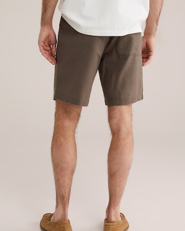 WE Fashion Loosefit Laskoshousut värissä vihreä