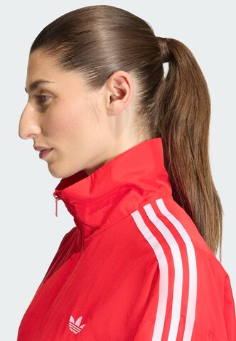 ADIDAS ORIGINALS Between-season jacket 'Firebird Adilenium' in Red