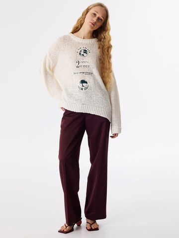 Pull-over Twist en beige