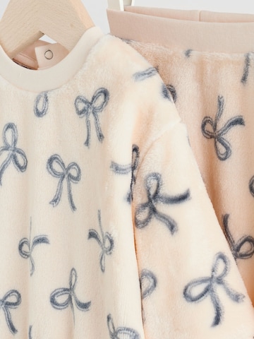 Set Next en rose