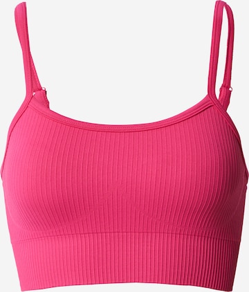aim'n Bralette Sports Bra 'PAPAYA' in Pink: front