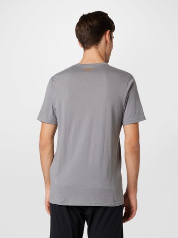 Maglia funzionale 'Team Issue' di UNDER ARMOUR in grigio