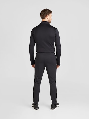 UNDER ARMOUR Regularen Športne hlače | črna barva