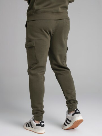 Tapered Pantaloni cargo di SikSilk in verde