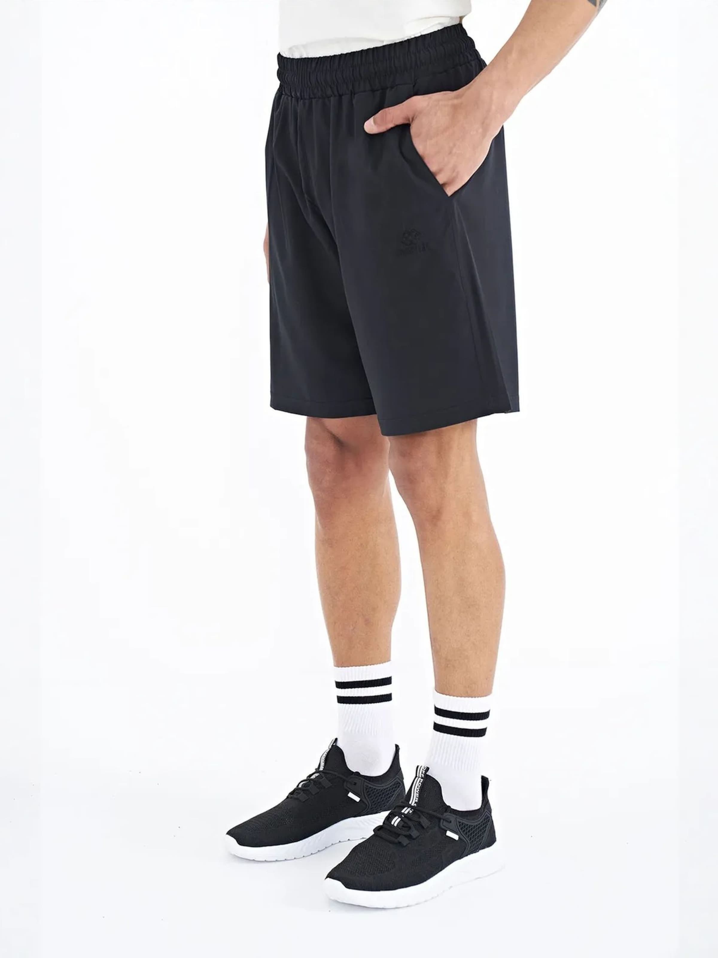 Wide leg Pantaloni di Tommy Life in nero