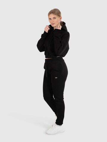 Veste de survêtement ' Elma ' Smilodox en noir