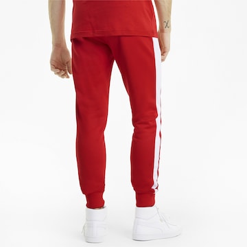 Tapered Pantaloni sportivi 'Iconic T7' di PUMA in rosso