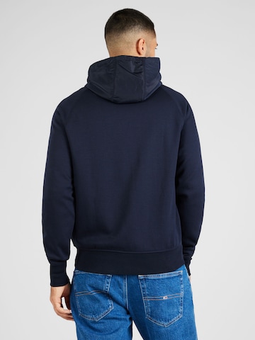 TOMMY HILFIGER - Sudadera con cremallera en azul