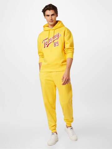 Tommy Jeans Alt kitsenev Püksid, värv kollane