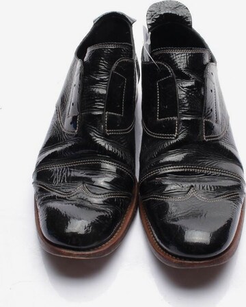 JIL SANDER Flats & Loafers in 38 in Black