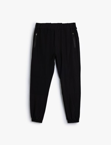 Koton Tapered Trousers in Black: front