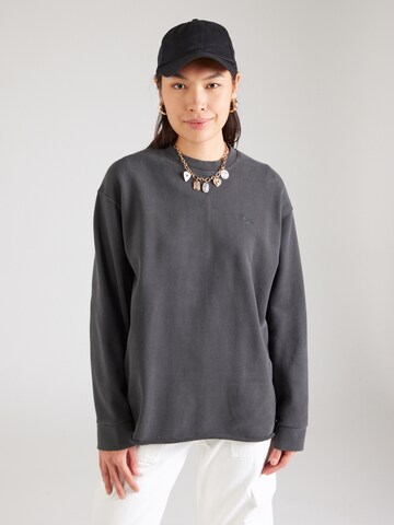 Superdry Sweatshirt 'Studios' in Zwart: voorkant