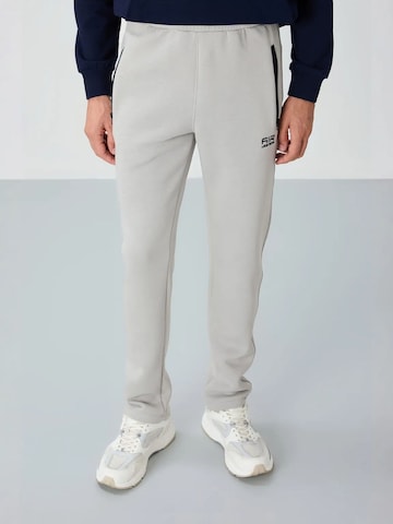 Pantaloni di Tommy Life in grigio: frontale