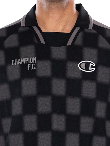 Maglietta 'POLO BLACK' di Champion in nero