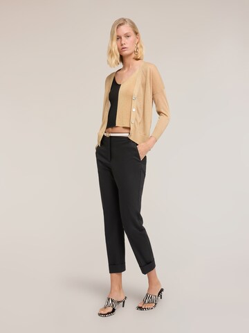 Cardigan MOTIVI en or