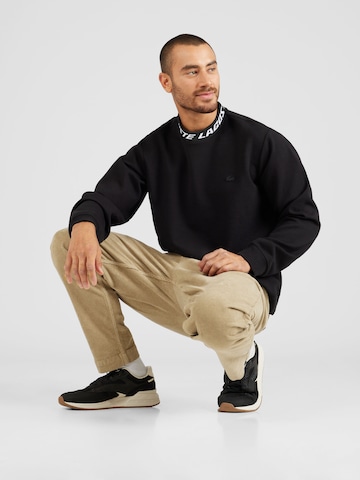 LACOSTE Sweatshirt i svart